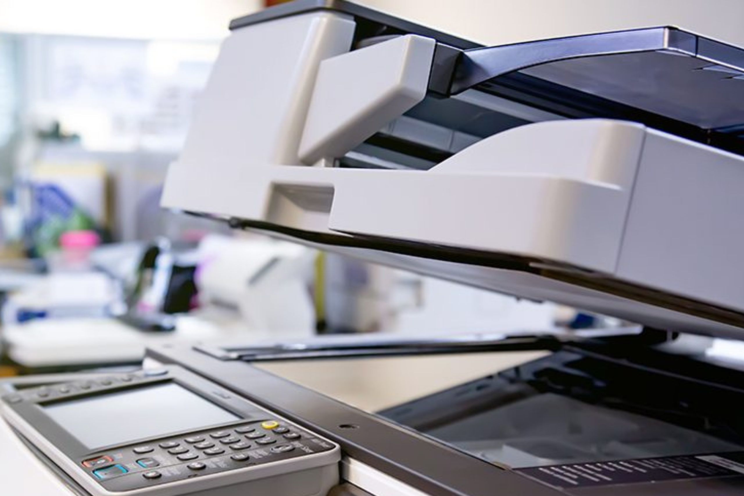 A well-organized design workspace with dual monitors and design software on display.